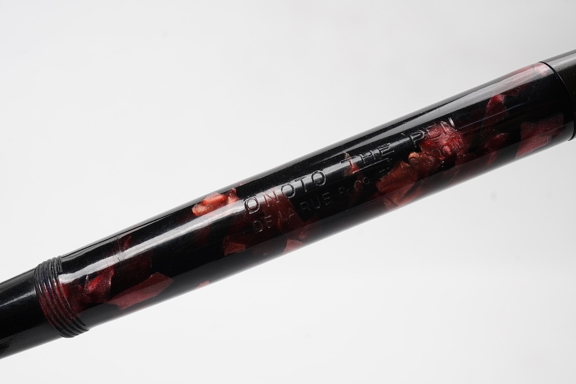 A De la Rue Onoto No.6234 piston fill fountain pen (working condition) in burgundy/black with DLR Onoto No.5 nib